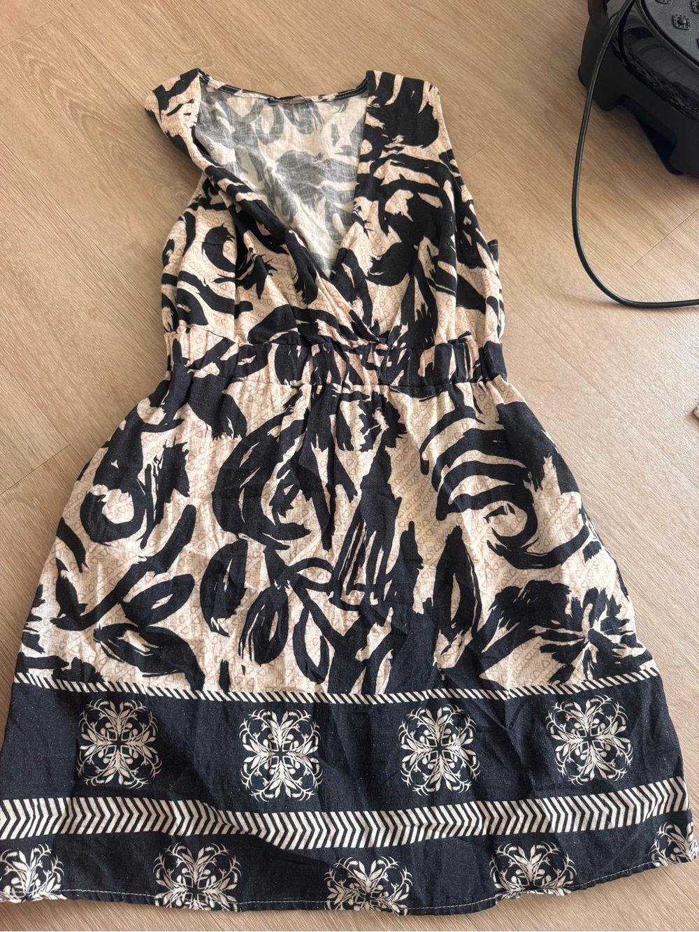 Sleeveless Cream and Black Floral-Print Wrap Mini Dress